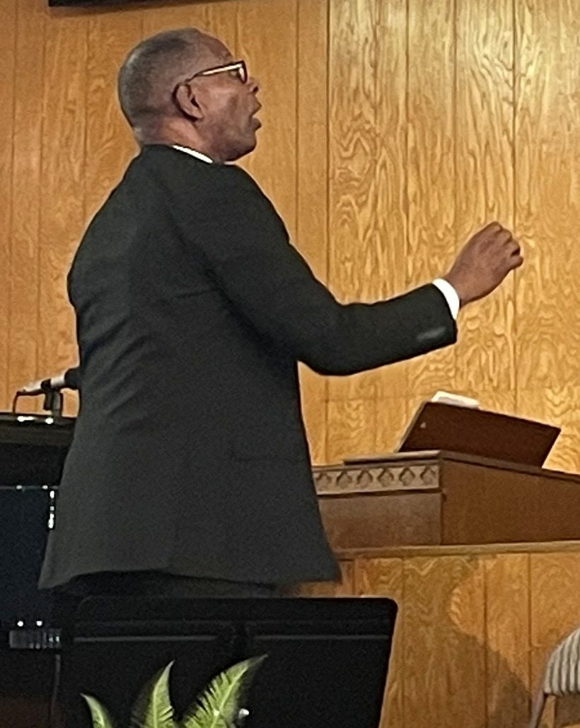 Dr. J. Philip Williams conducting