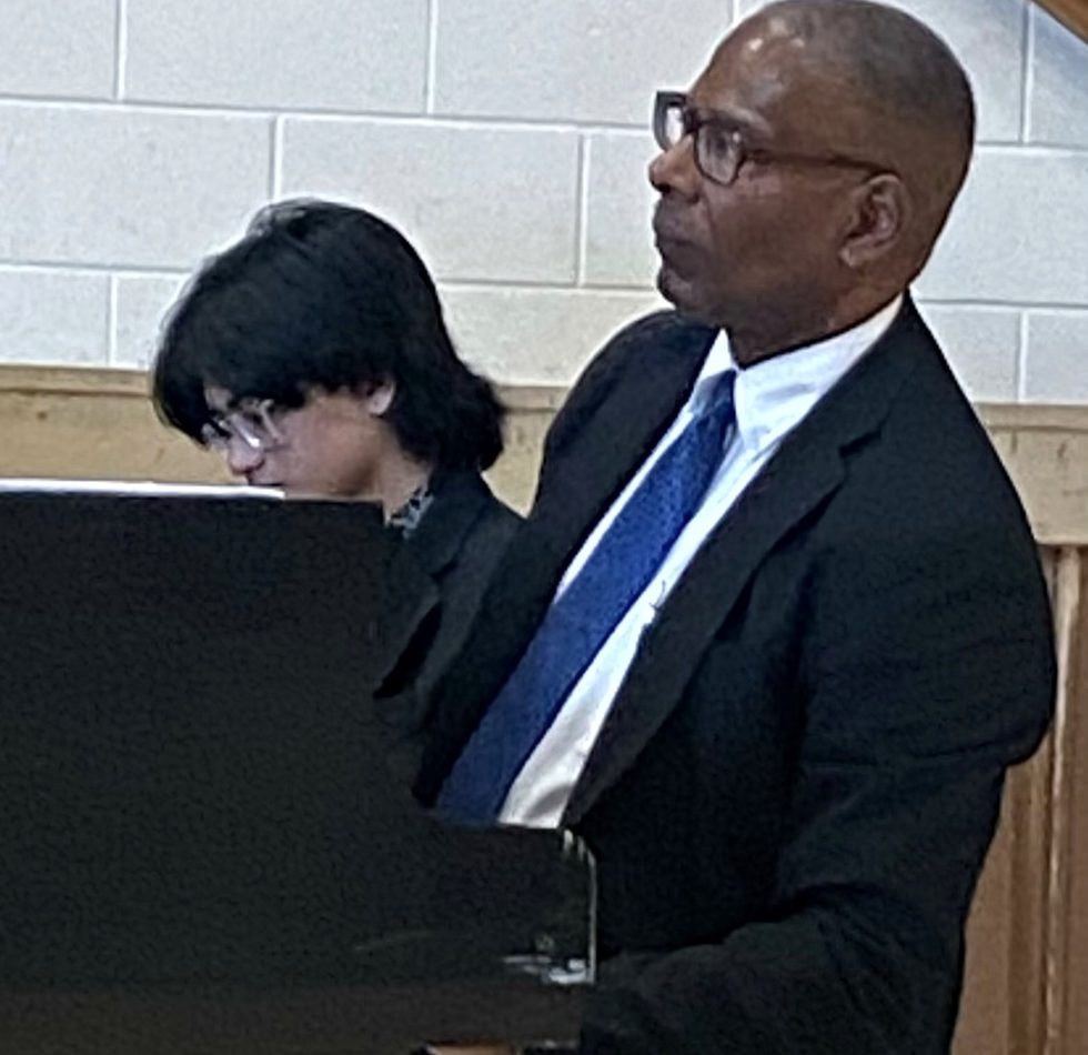 Dr. Williams in rehearsal at the piano